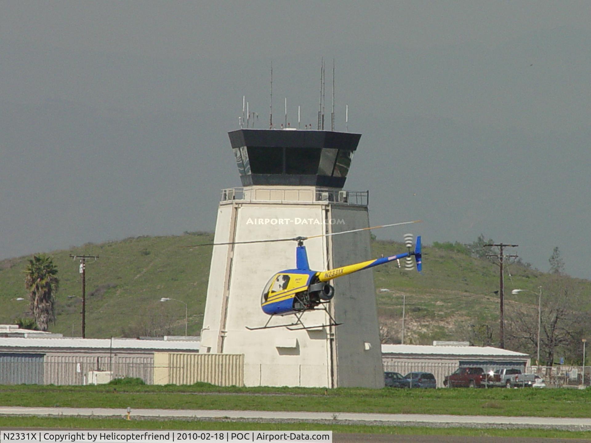 N2331X, 1992 Robinson R22 BETA C/N 2145, Lifting off on runway 26L across from the tower
