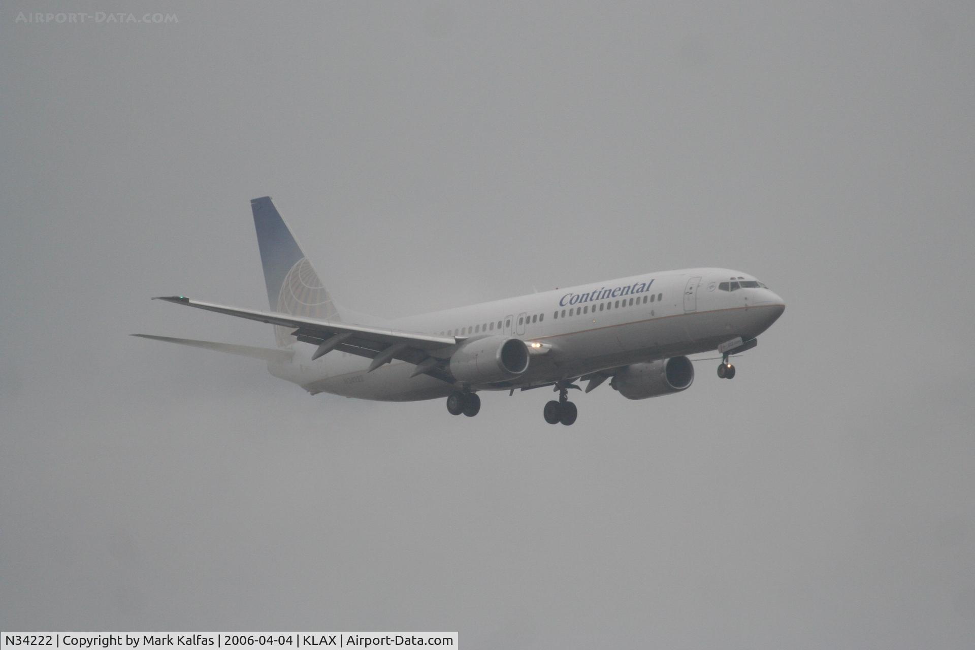 N34222, 1998 Boeing 737-824 C/N 28931, Continental Airlines Boeing 737-824, 7R approach in WX KLAX.