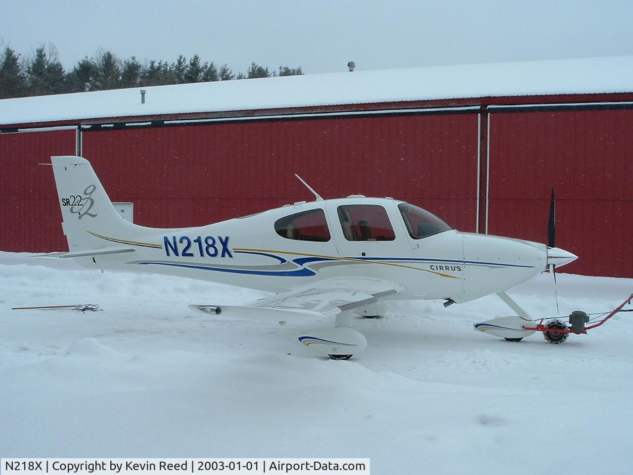 N218X, 2004 Cirrus SR22 C/N 1134, Cirrus sr22 winter, coming out of the hangar.