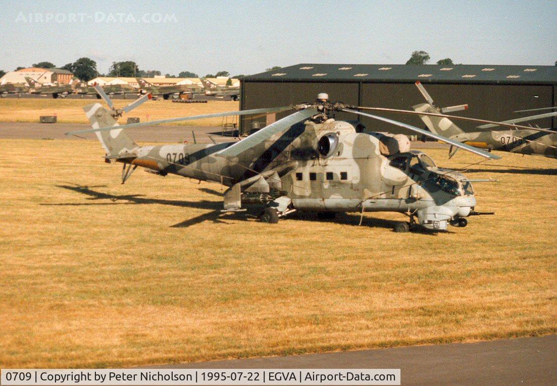 0709, Mil Mi-24V Hind E C/N 730709, Hind E helicopter gunship of 331 Squadron Czech Air Force on the flight-line at the 1995 Intnl Air Tattoo at RAF Fairford.