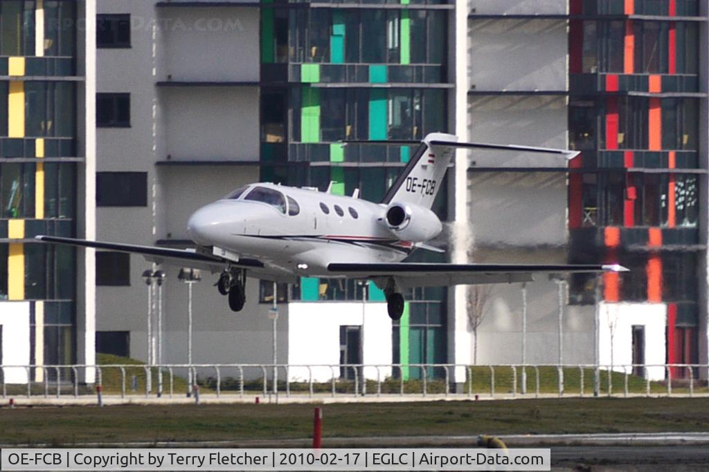 OE-FCB, 2008 Cessna 510 Citation Mustang Citation Mustang C/N 510-0044, Austrian Cessna 510 Mustang lands against the distinctive London City Airport background