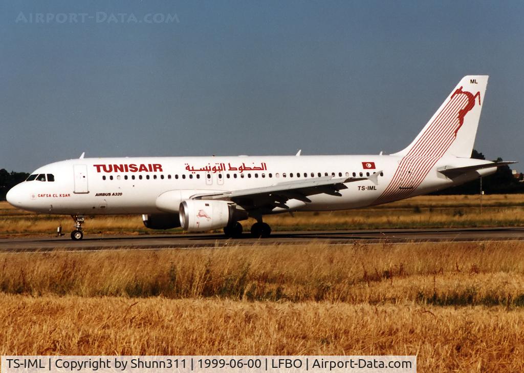 TS-IML, 1999 Airbus A320-211 C/N 0958, Arriving rwy 33L with old livery