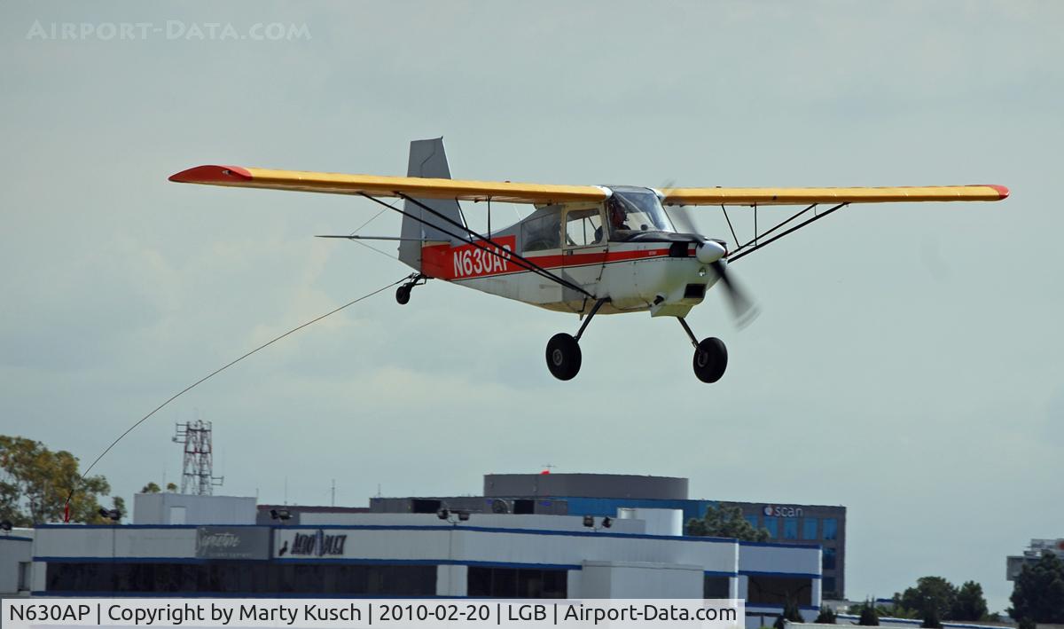 N630AP, 1974 Bellanca 8GCBC C/N 69-74, The number 1 banner tow pilot approaching the poles