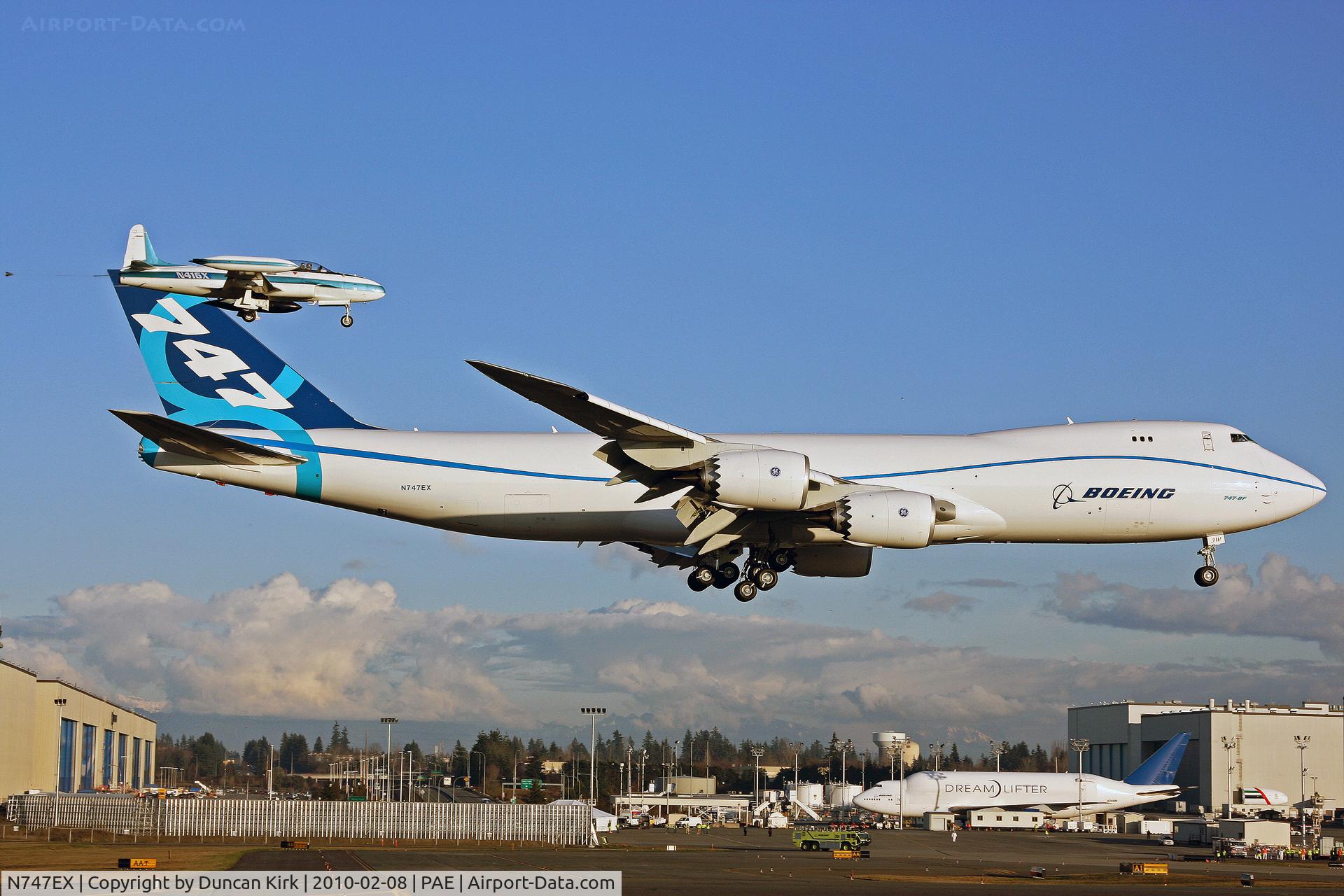 N747EX, 2010 Boeing 747-8F C/N 35808, B.747-8 accompanied by one of Boeing's T-33's