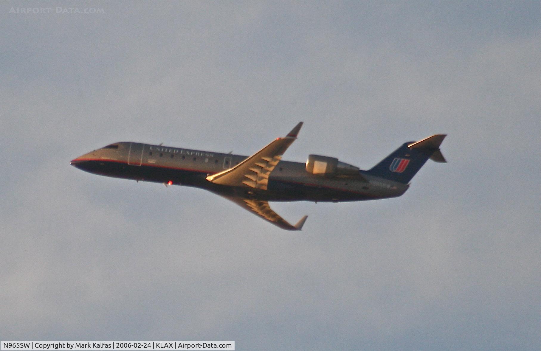 N965SW, 2003 Bombardier CRJ-200ER (CL-600-2B19) C/N 7871, SkyWest Bombardier CL-600-2B19, N965SW departing 25R KLAX.
