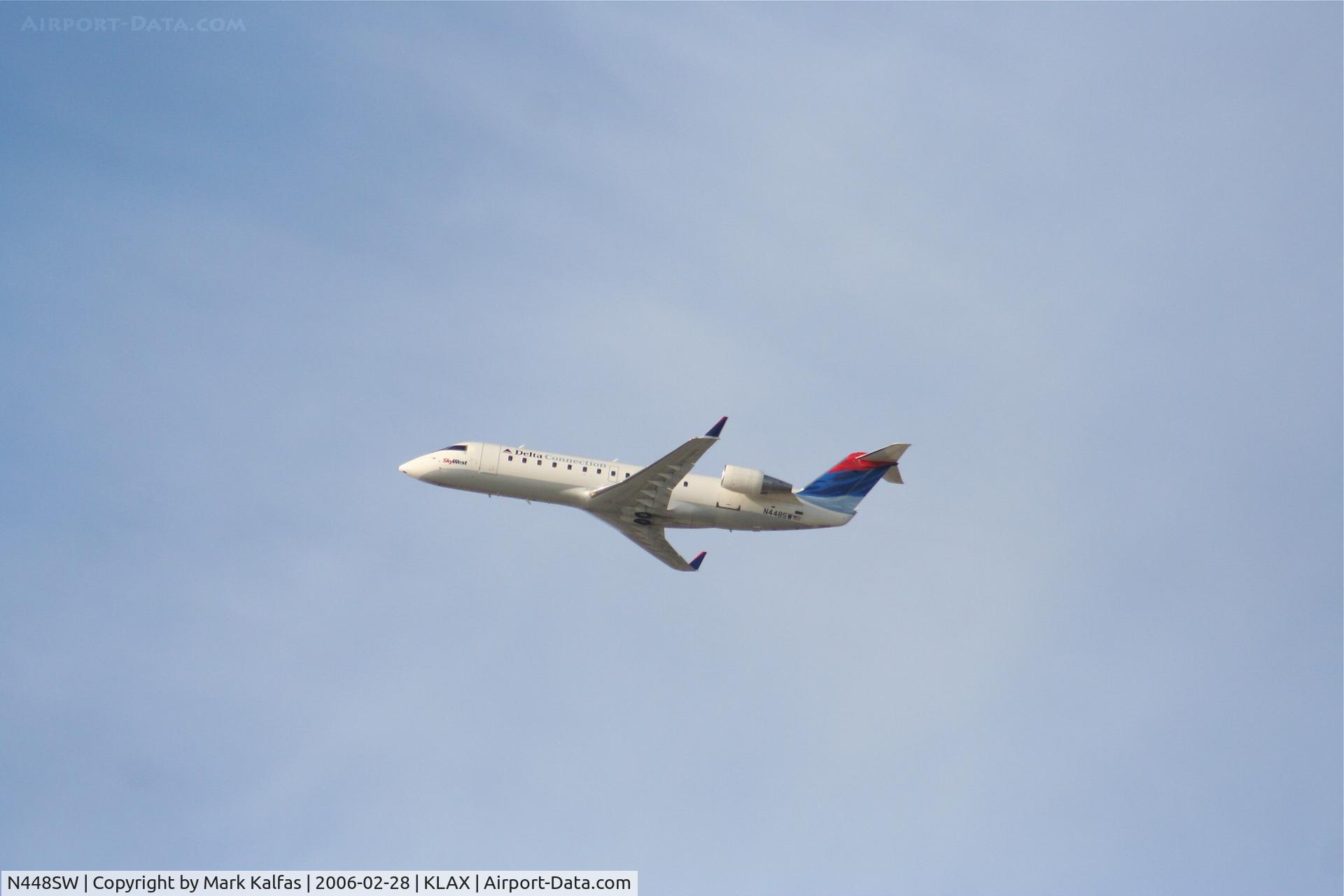N448SW, 2002 Bombardier CRJ-200LR (CL-600-2B19) C/N 7678, SkyWest Bombardier CL-600-2B19, N448SW departing 25R KLAX.