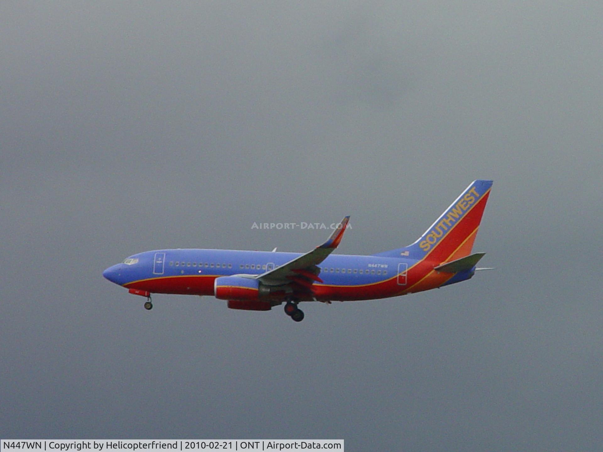 N447WN, 2003 Boeing 737-7H4 C/N 33720, On final to Ontario, on a very cloudy day
