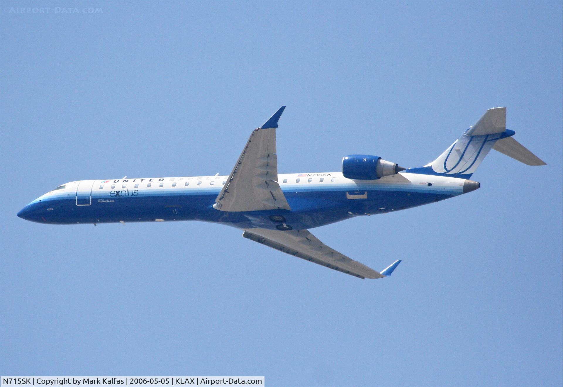 N715SK, 2004 Bombardier CRJ-700 (CL-600-2C10) Regional Jet C/N 10179, SkyWest Bombardier CL-600-2C10,  N715SK departing 25R KLAX.
