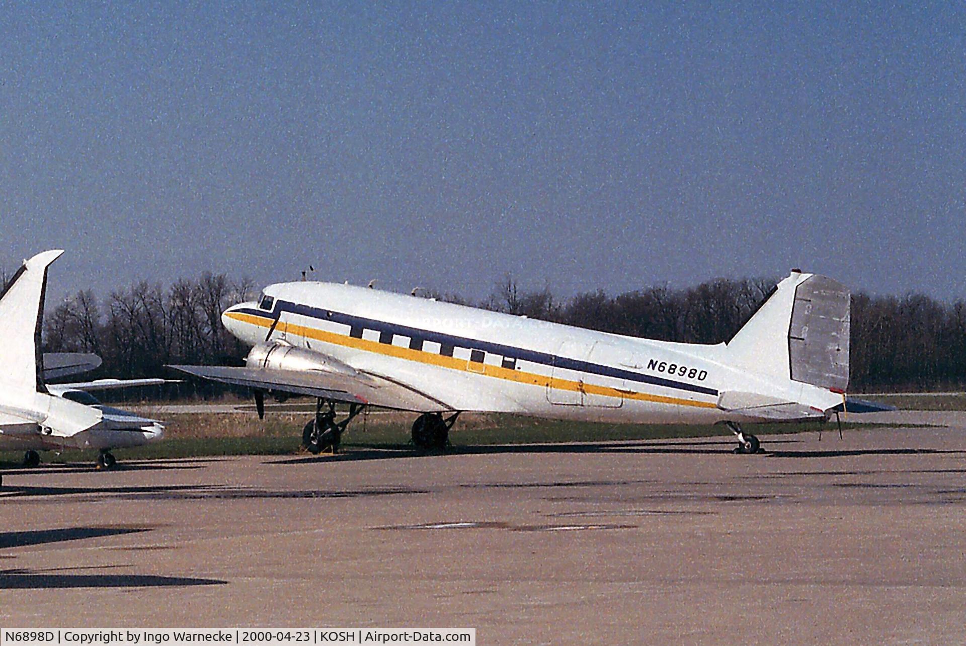 N6898D, Douglas DC-3-G202A C/N 20082, Douglas DC-3 at the Basler Co apron of Wittman regional airport, Oshkosh WI
