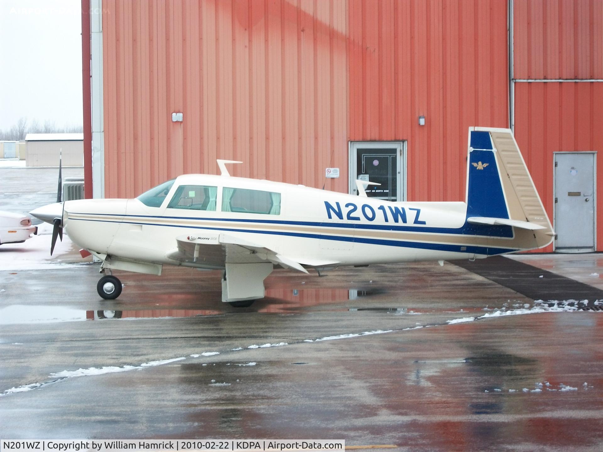 N201WZ, 1977 Mooney M20J 201 C/N 24-0411, Mooney Sitting outside of Travel Express Aviation