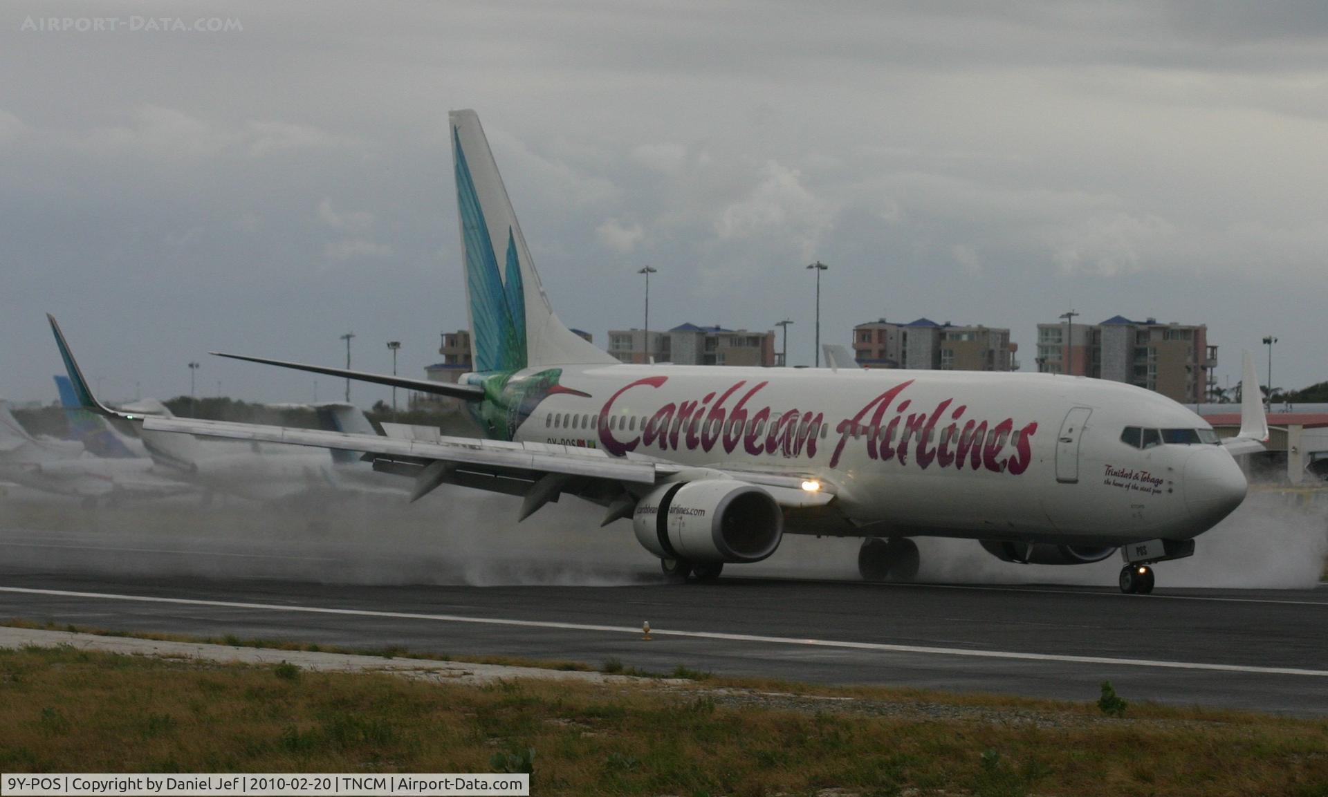 9Y-POS, 2000 Boeing 737-8Q8 C/N 28230, Caribbean airlines landing on a wet day at TNCM