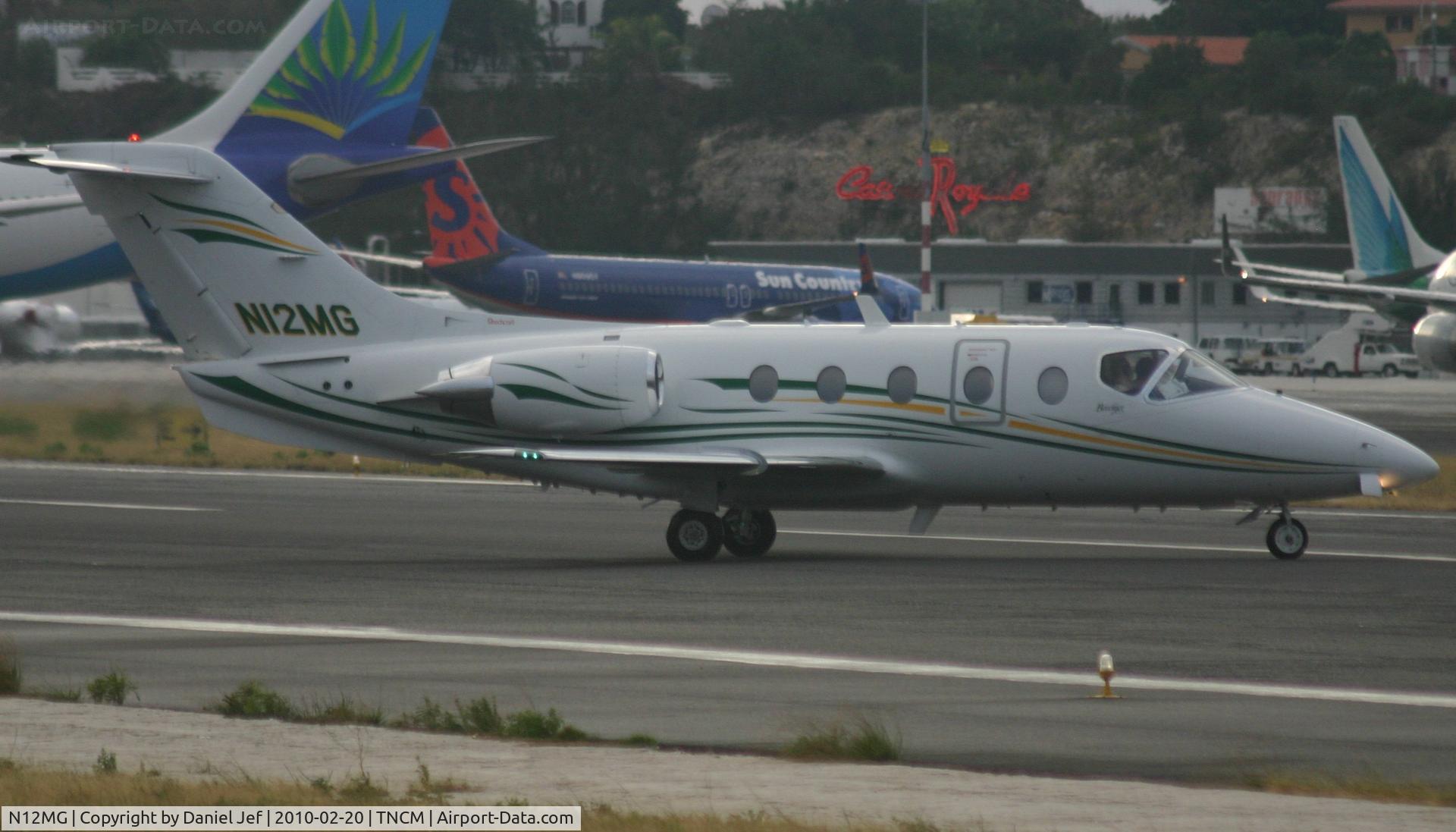 N12MG, 2001 Raytheon Aircraft Company 400A C/N RK-331, N12MG just landed at TNCM and back tracking