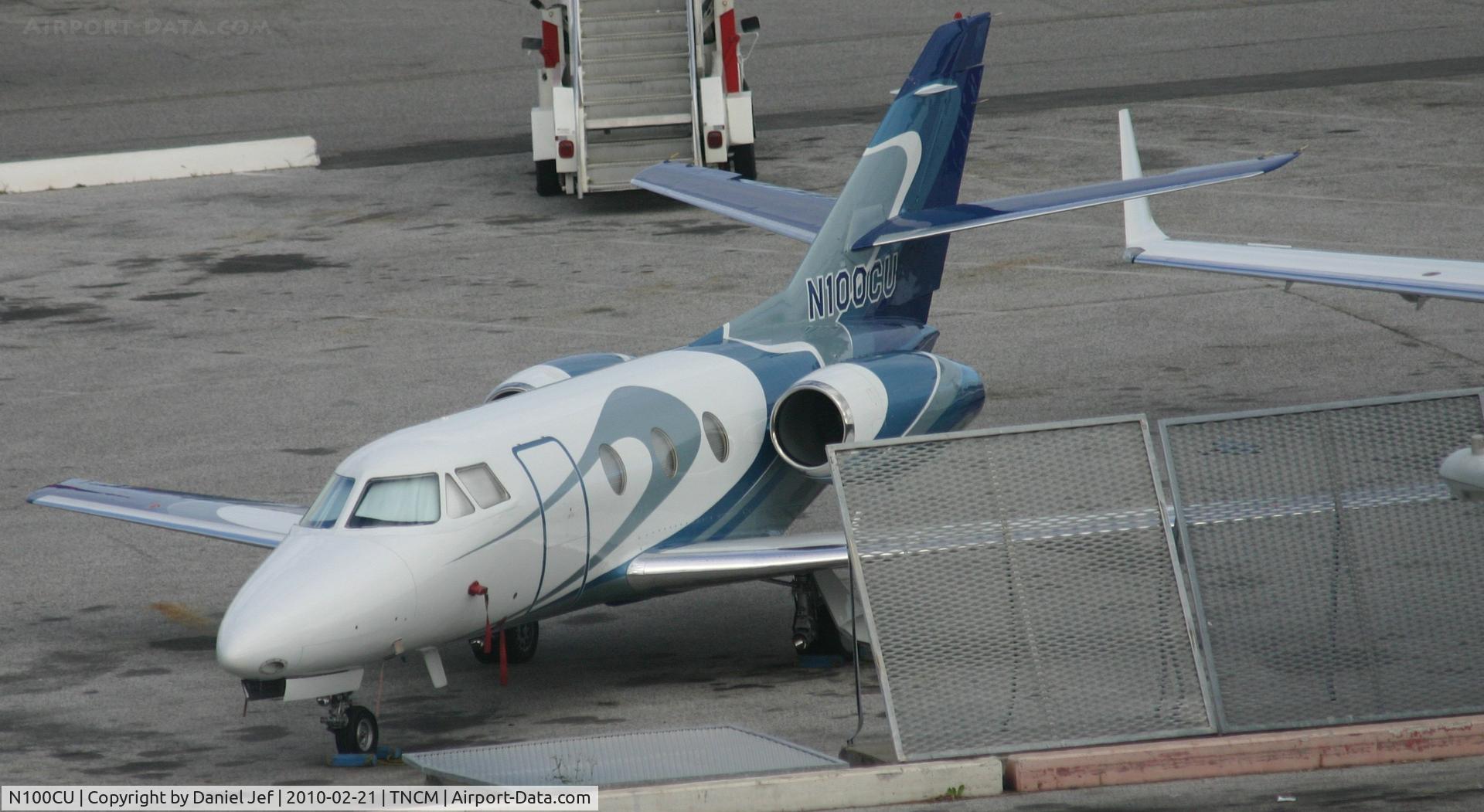 N100CU, 1977 Dassault Falcon 10 C/N 104, N100cu park at the main ramp at TNCM