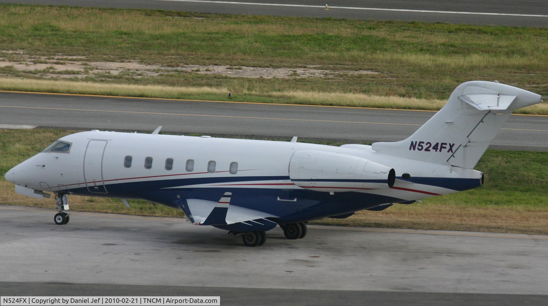 N524FX, 2006 Bombardier Challenger 300 (BD-100-1A10) C/N 20095, N524FX park at the cargo ramp at TNCM