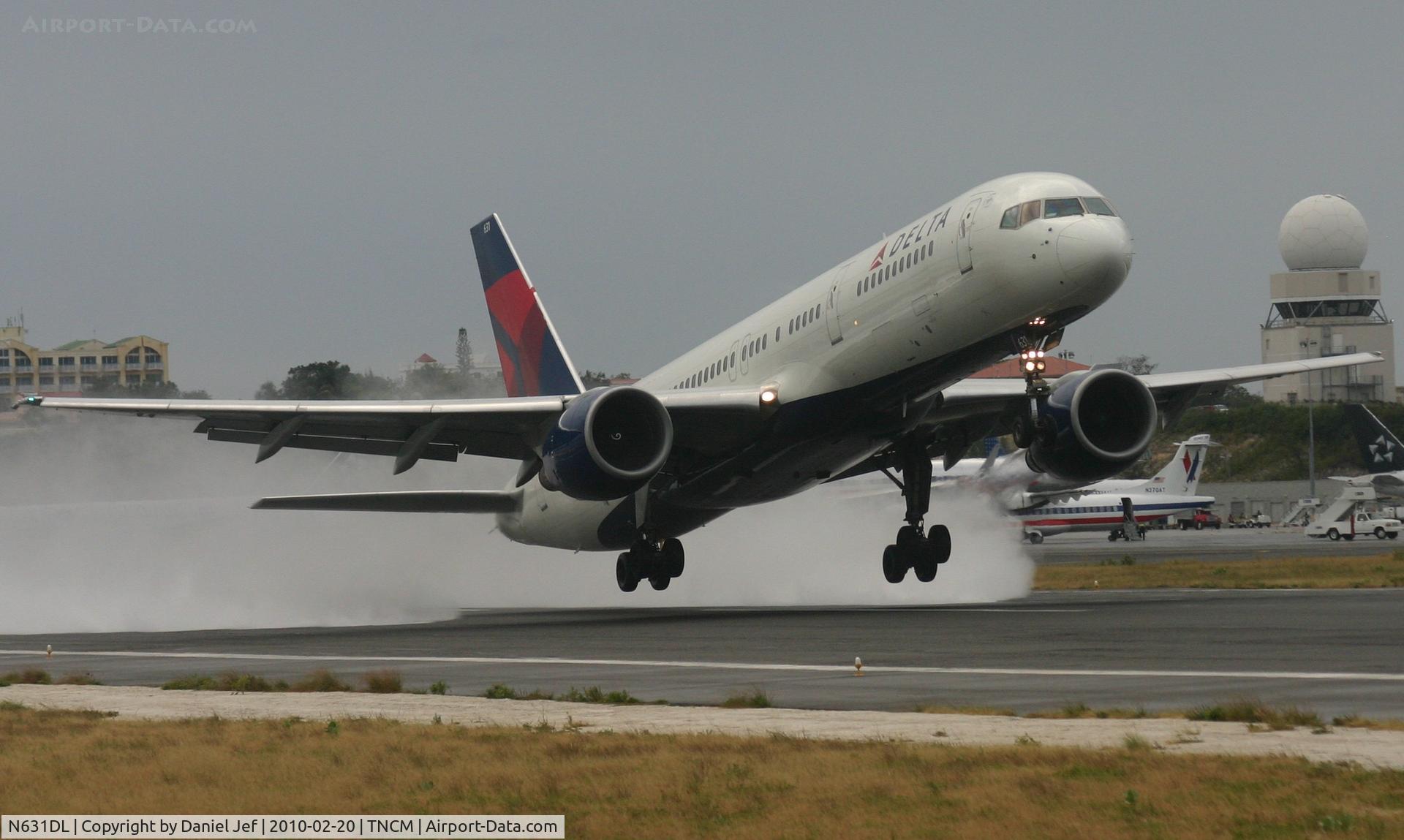 N631DL, 1987 Boeing 757-232 C/N 23612, Delta N631DL departing TNCM runway 10 wet