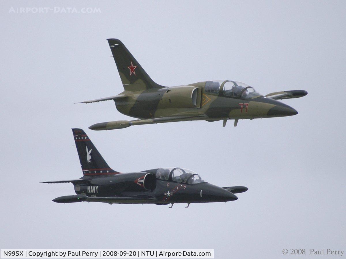 N995X, 1983 Aero L-39C Albatros C/N 332507, Leading N55107 through the turn