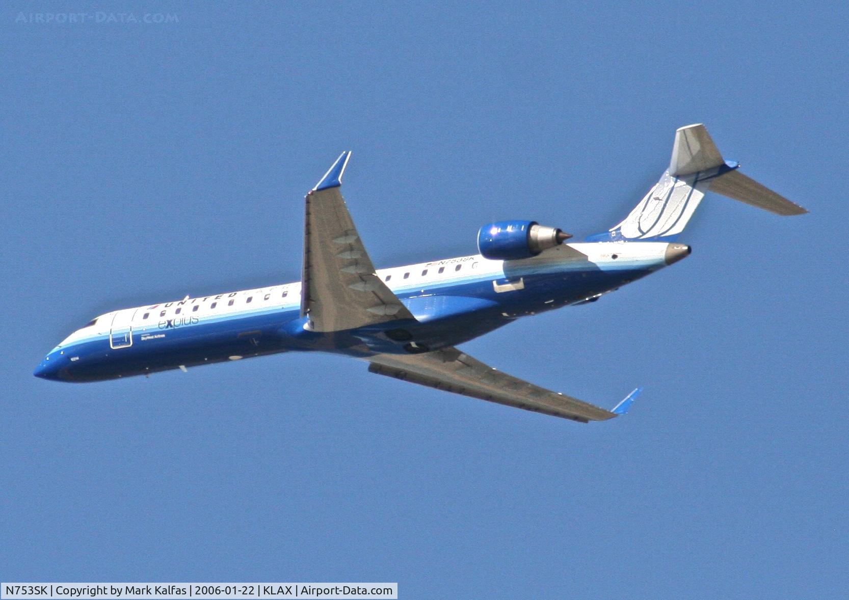 N753SK, 2005 Bombardier CRJ-701ER (CL-600-2C10) Regional Jet C/N 10214, SkyWest Bombardier CL-600-2B19,N753SK departing 25R KLAX.
