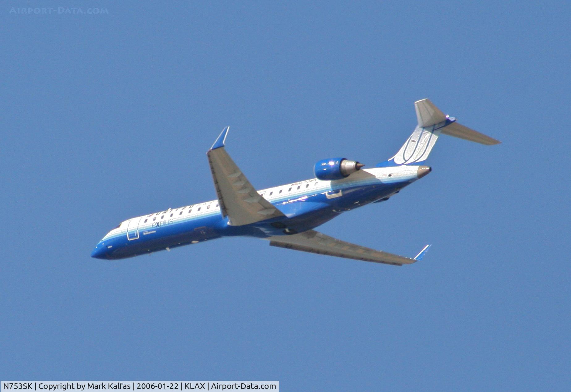 N753SK, 2005 Bombardier CRJ-701ER (CL-600-2C10) Regional Jet C/N 10214, SkyWest Bombardier CL-600-2B19,N753SK departing 25R KLAX.