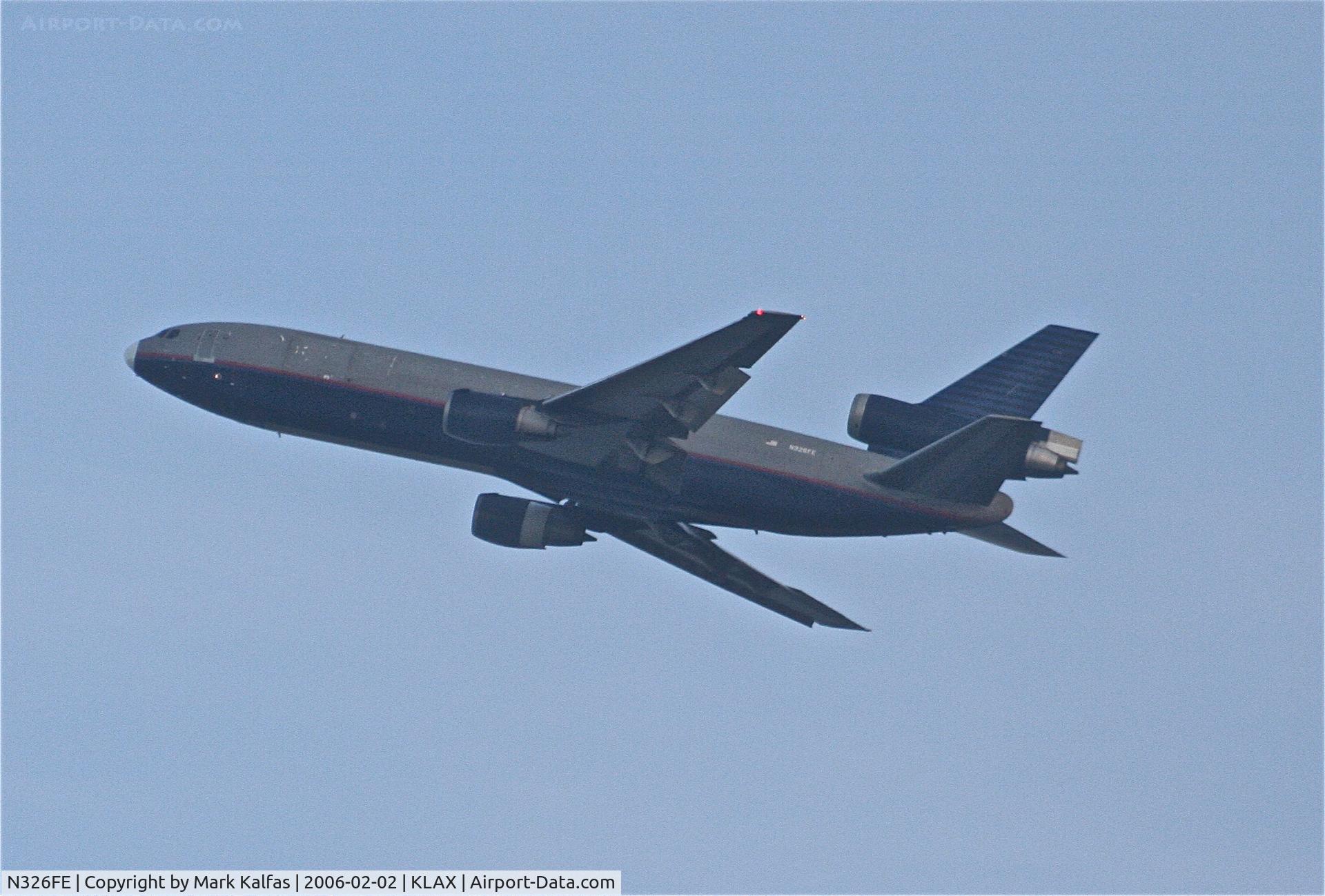 N326FE, 1984 McDonnell Douglas DC-10-30 C/N 47813, Fed Ex, N326FE, DC-10-30 (ex-United Airlines N1854U) ghost plane, departs 25L KLAX.