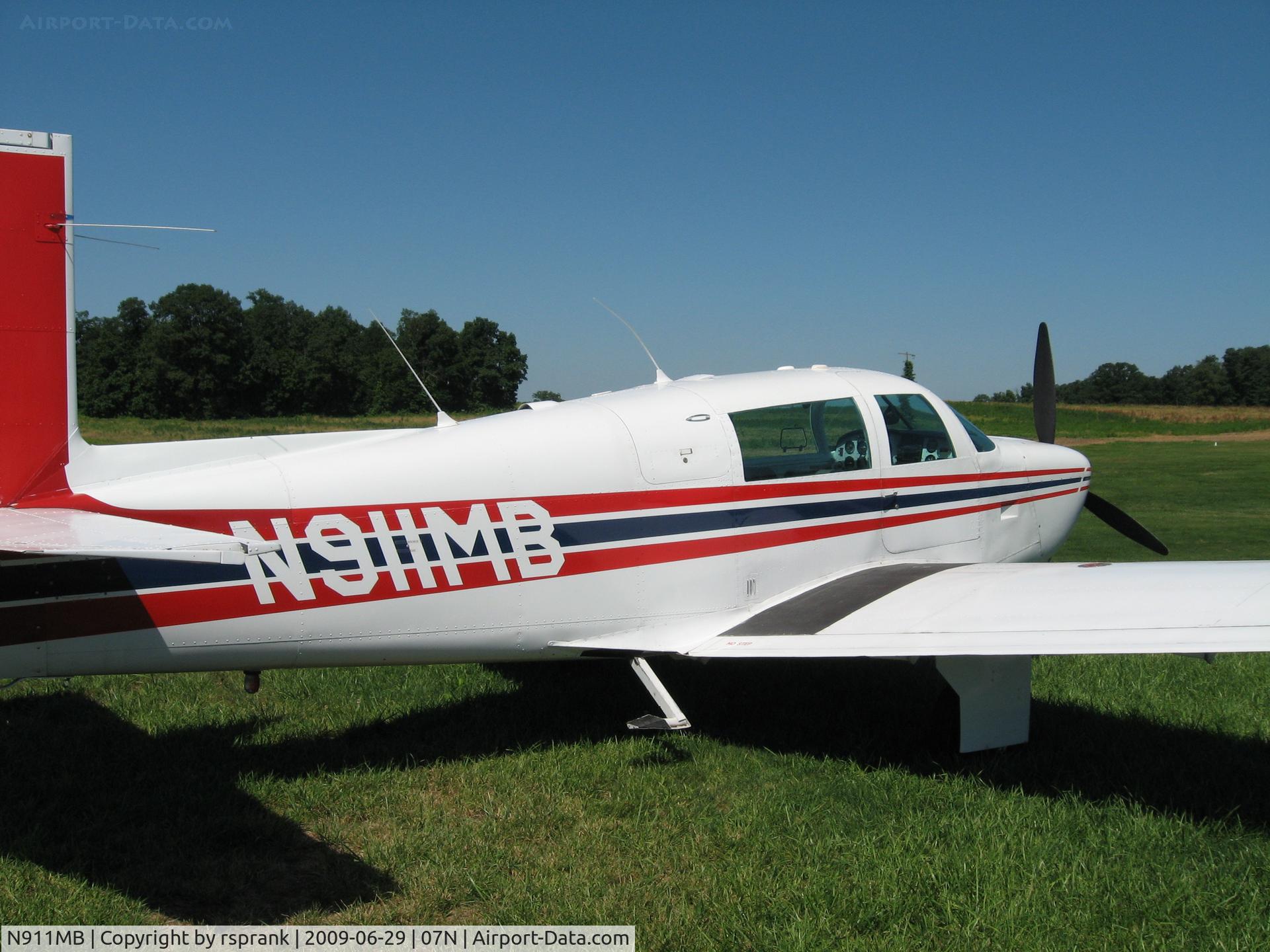 N911MB, 1966 Mooney M20F Executive C/N 670042, Mooney in the sun