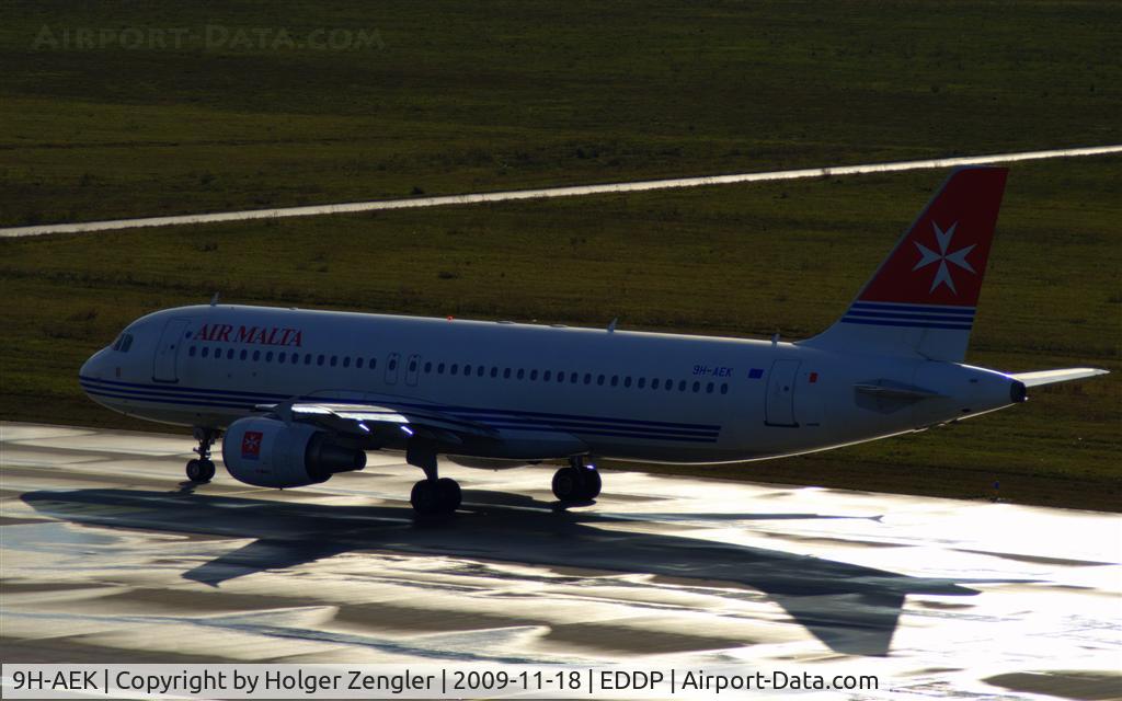 9H-AEK, 2004 Airbus A320-211 C/N 2291, A backlighted photo of a leaving AIR MALTA Airbus