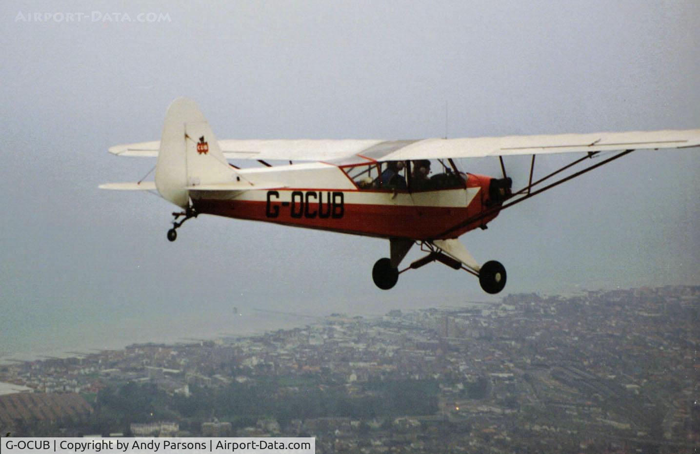 G-OCUB, 1944 Piper L-4J Grasshopper (J3C-65D) C/N 13215, Old scanned print Air to air over Bognor Regis many years ago