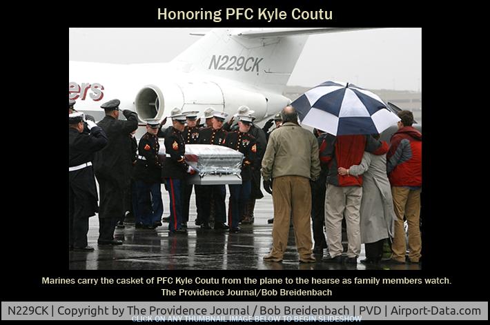 N229CK, 1970 Dassault Fan Jet Falcon (20D) C/N 229, Family members of Marine Pfc. Kyle J. Coutu, of Pawtucket, watch as his casket is taken from a private jet after arriving Wednesday 2/24/2010 at T.F. Green Airport in Warwick. Coutu was killed in combat in Afghanistan.