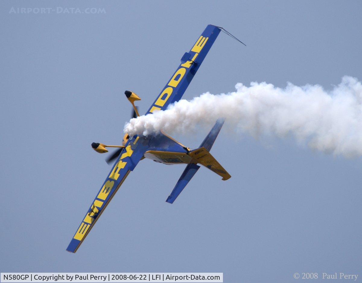 N580GP, 1992 Mudry CAP-231EX C/N 03, Showing off the opposing colors on her belly as the smoke rolls
