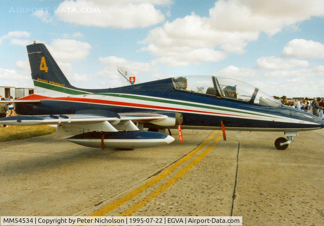 MM54534, Aermacchi MB-339PAN C/N 6741/136/AA068, MB.339PAN number 4 of the Frecce Tricolori display team on display at the 1995 Intnl Air Tattoo at RAF Fairford