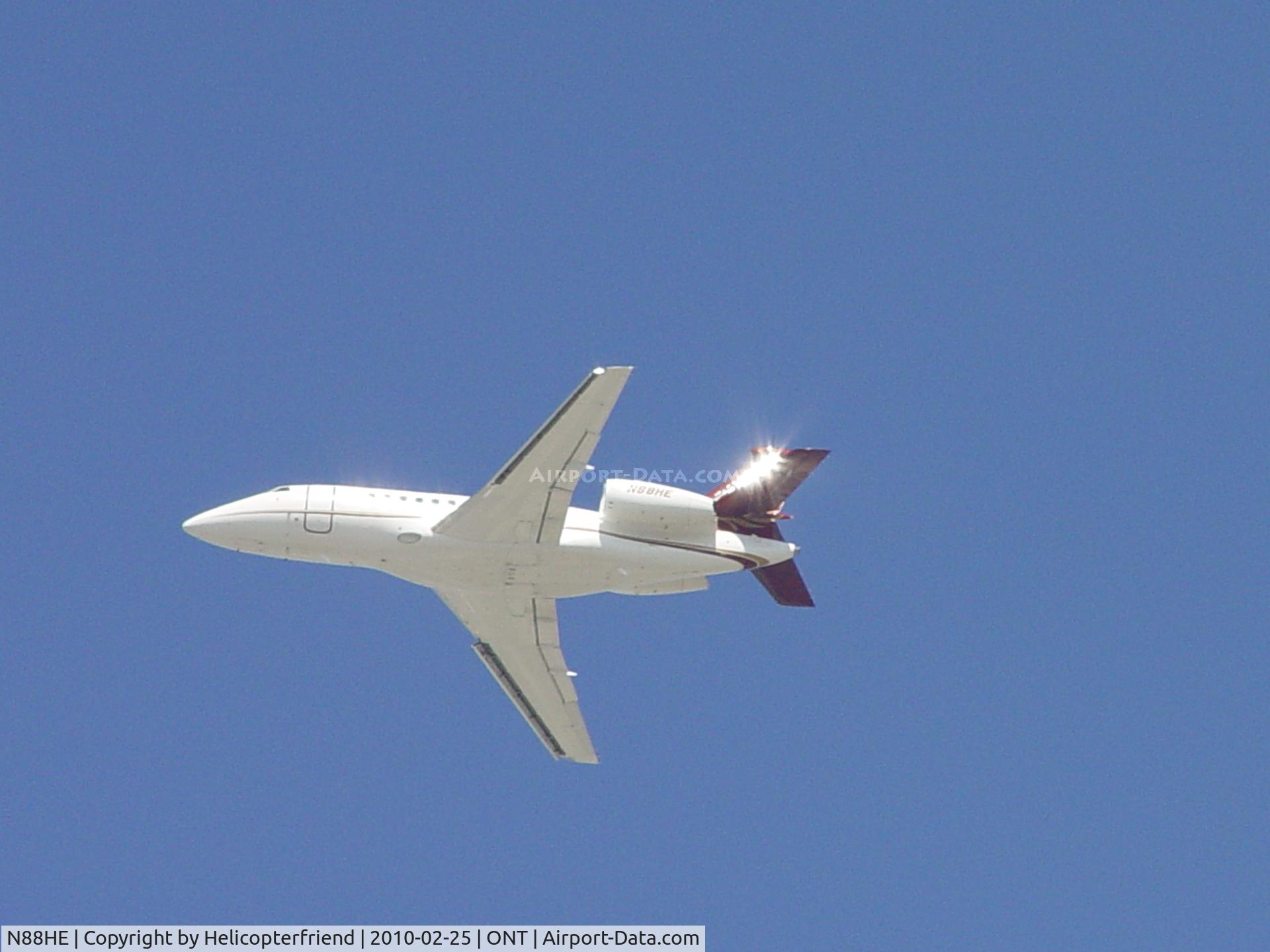 N88HE, 2006 Dassault Falcon 2000EX C/N 79, Taking off from Ontario westbound