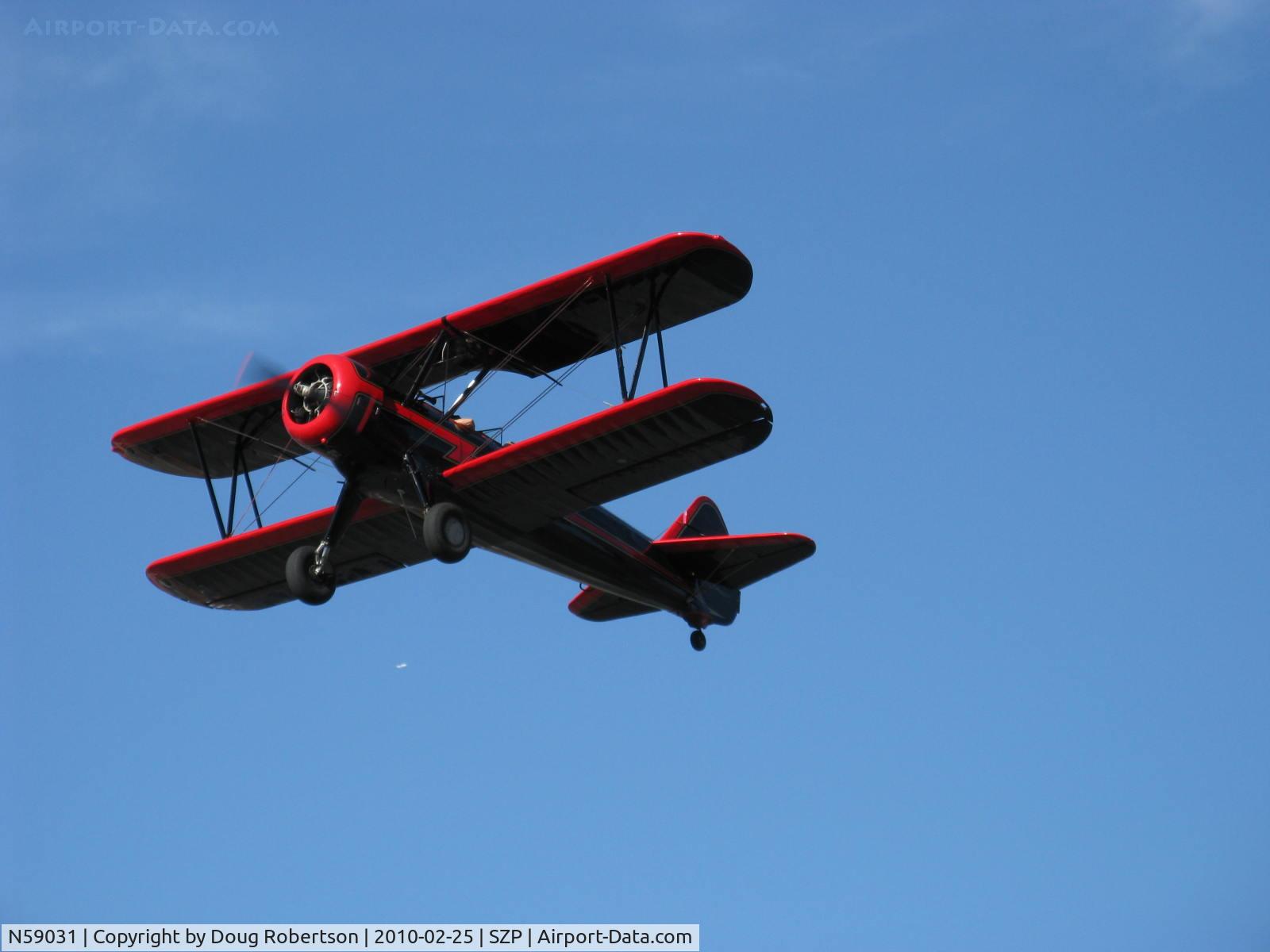 N59031, 1941 Boeing A75N1(PT17) C/N 75-3808, 1941 Boeing Stearman A75N1, Continental W670 220 Hp, takeoff climb Rwy 22