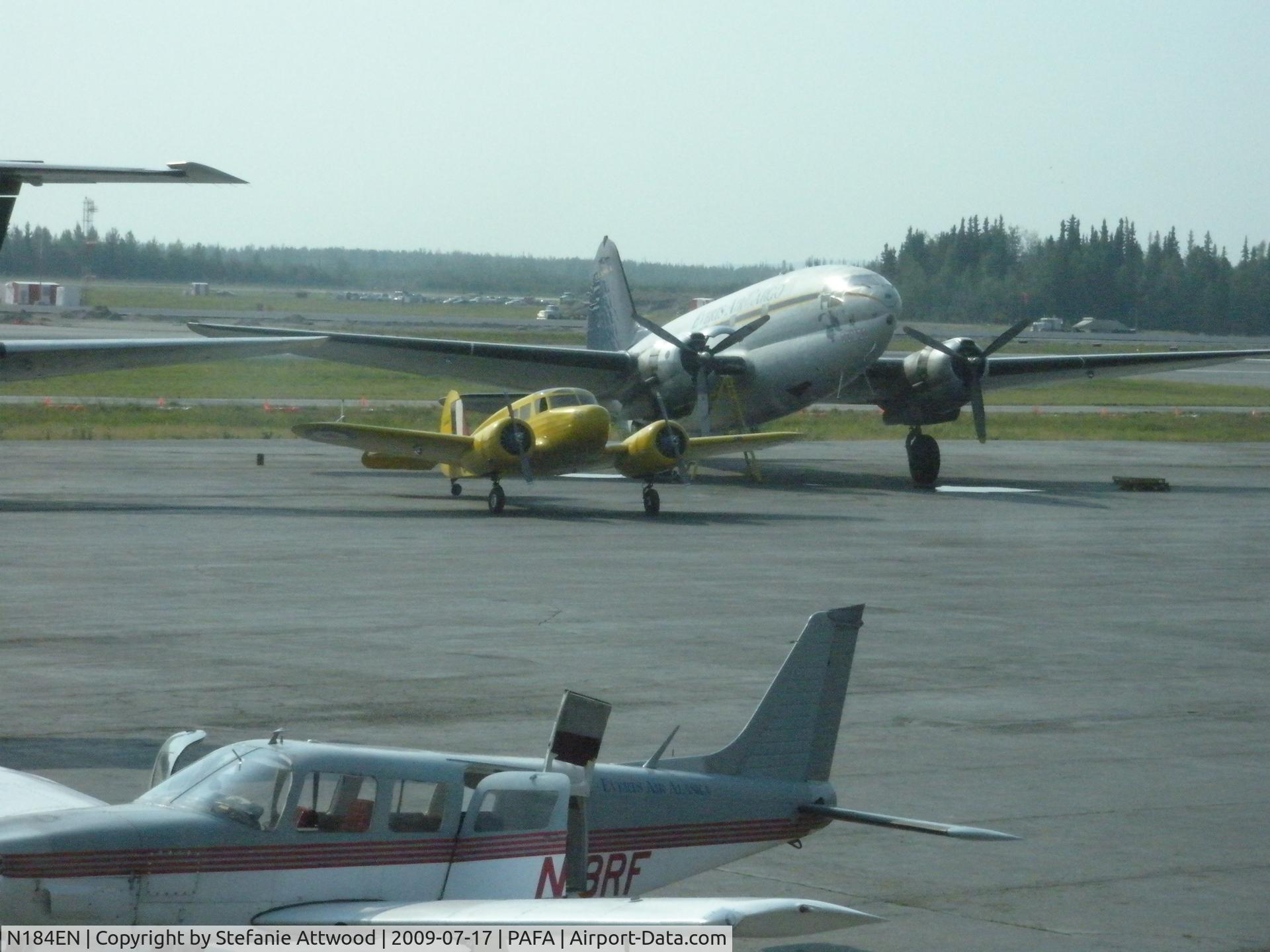 N184EN, 1943 Cessna UC-78B (T-50) Bobcat Bobcat C/N 6247, parked next to C46 in Fairbanks, AK