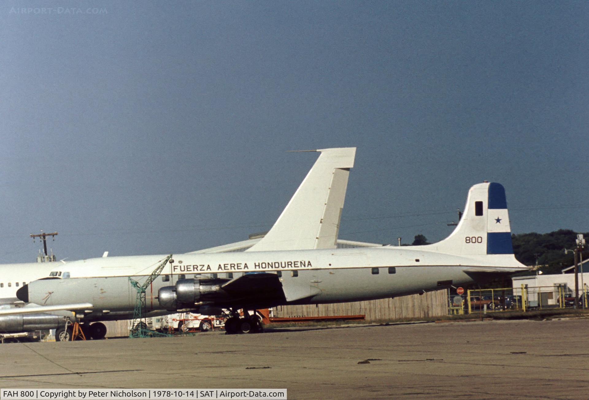 FAH 800, 1953 Douglas C-118A Liftmaster (DC-6A) C/N 44642, C-118A Liftmaster oF the Honduras Air Force undergoing maintenance at San Antonio in October 1978.