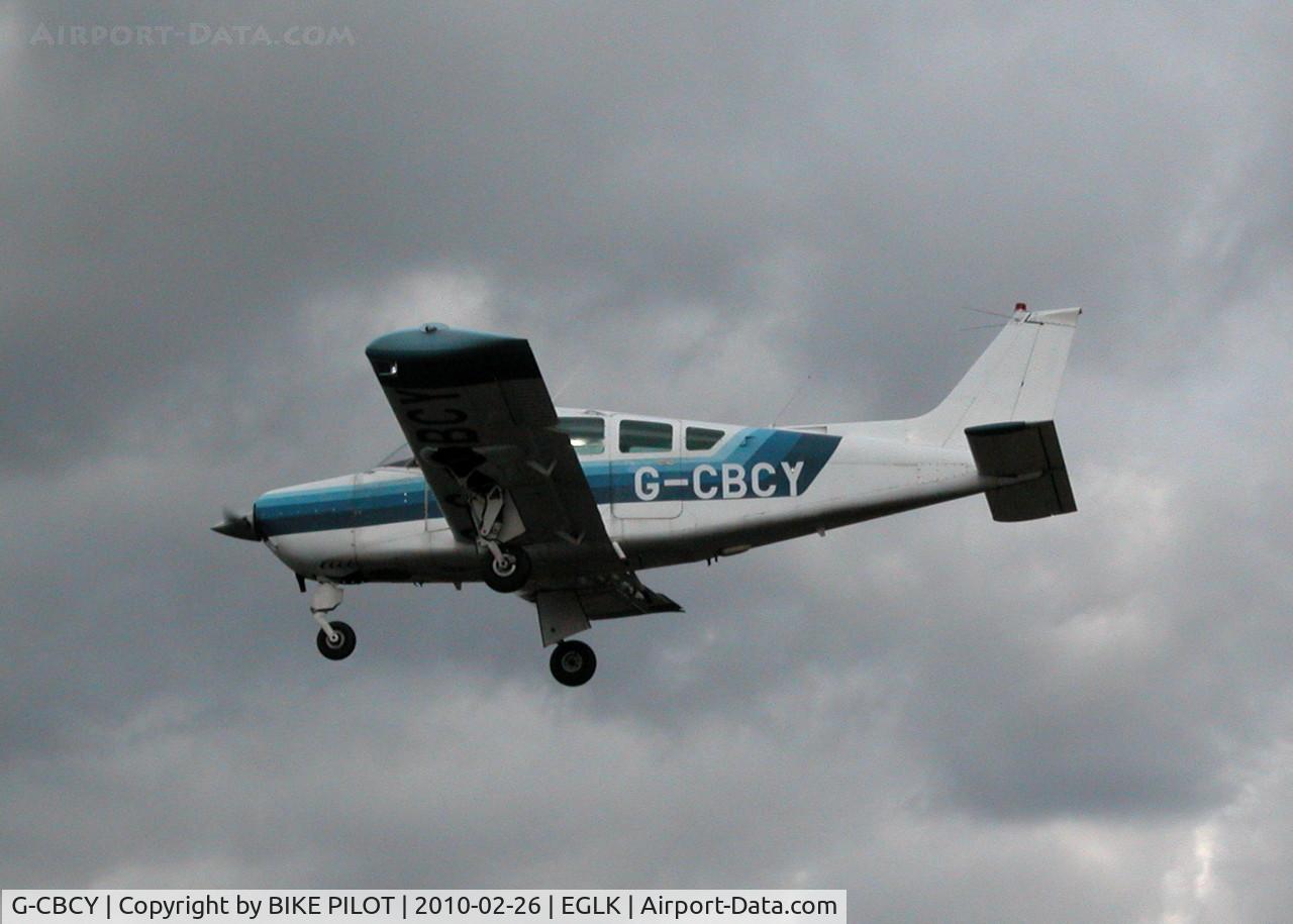G-CBCY, 1977 Beech C24R Sierra Super C/N MC-491, DOING A COUPLE OF TOUCH AND GOES ON RWY 25