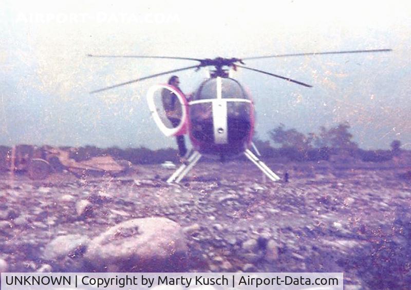 UNKNOWN, Helicopters Various C/N unknown, Steve, from the Mark III home development in Upland, Ca.  1978, preparing to depart in the Hughes 500C (North of Baseline & West of Wilson)