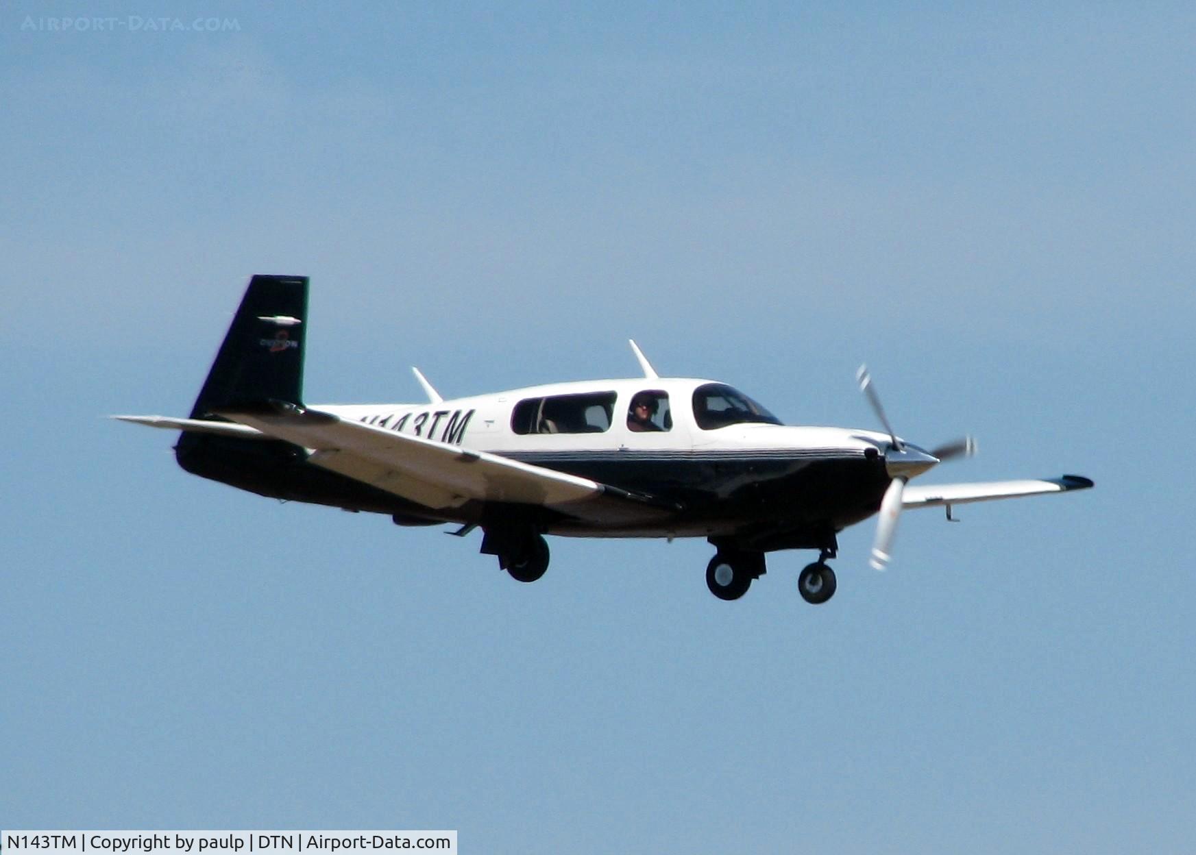 N143TM, 2000 Mooney M20R Ovation C/N 29-0242, Landing on runway 14 at Downtown Shreveport.