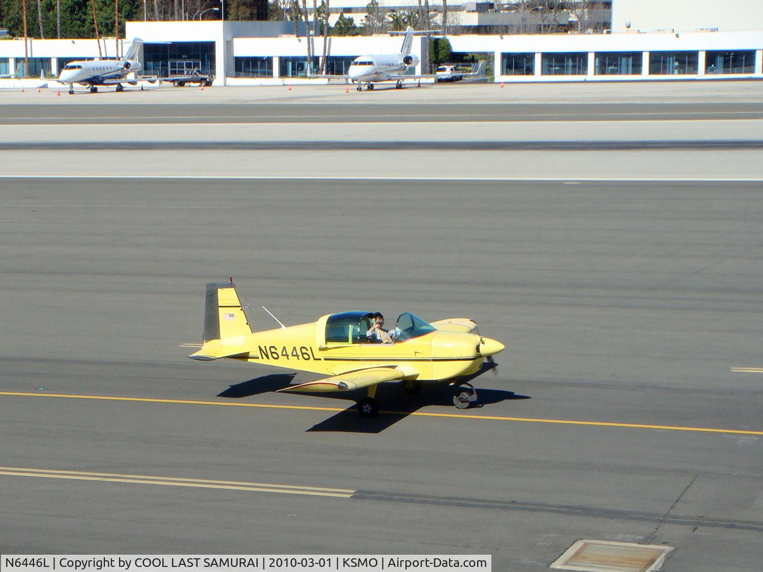 N6446L, 1972 American Aviation AA-1A Trainer C/N AA1A-0446, taxiing on taxi way Bravo in front of Typhoon / Hump