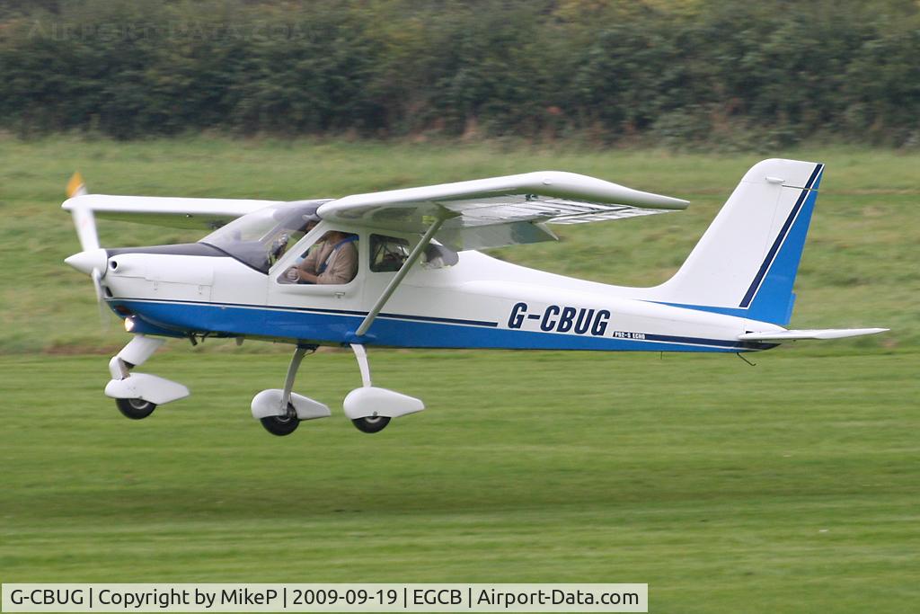 G-CBUG, 2002 Tecnam P-92EM Echo C/N PFA 318-13662, Arriving at the September 2009 fly-in.