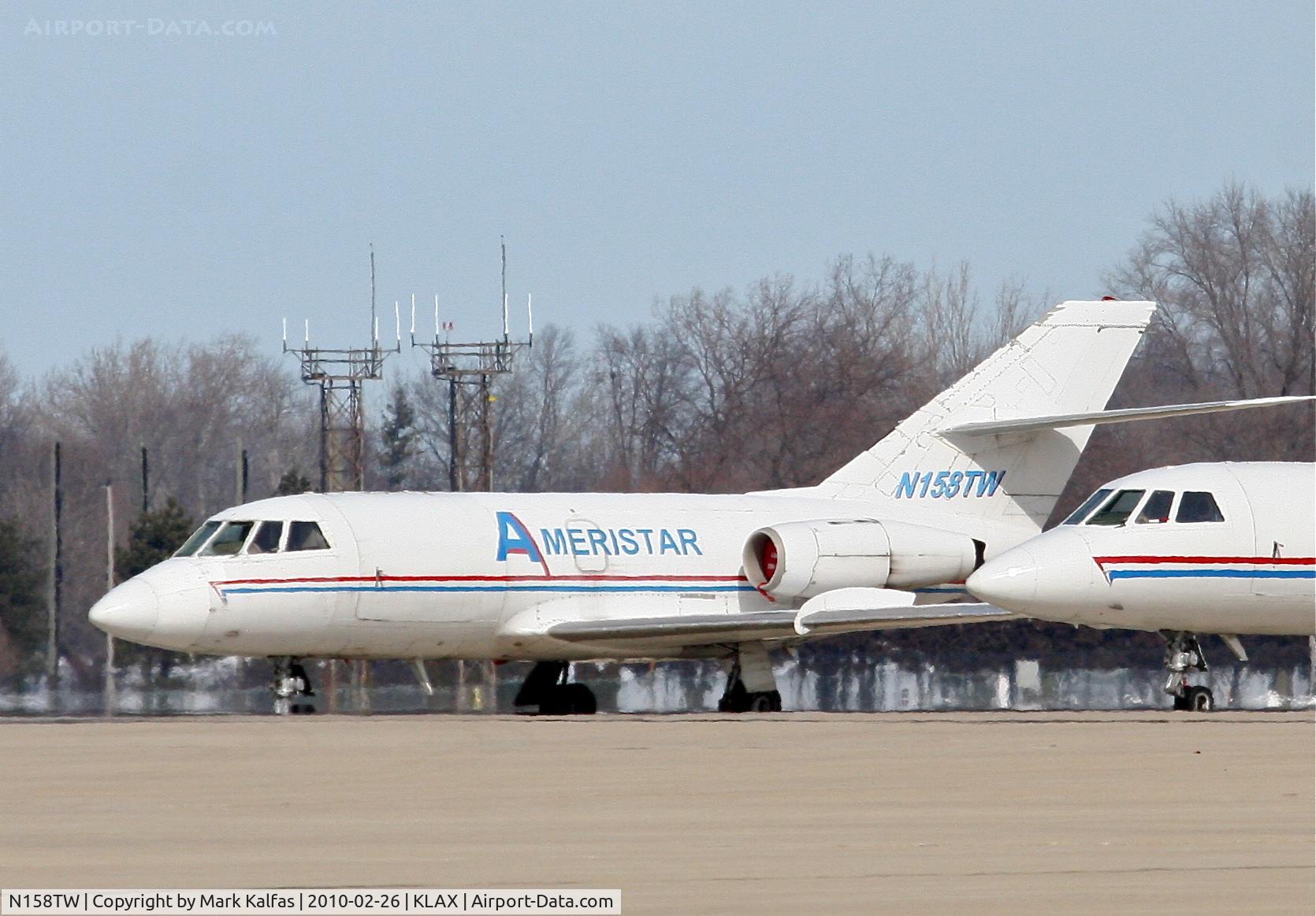 N158TW, 1968 Dassault Fan Jet Falcon (20C) C/N 158, Ameristar FALCON 20 N158TW on the ramp KDPA.