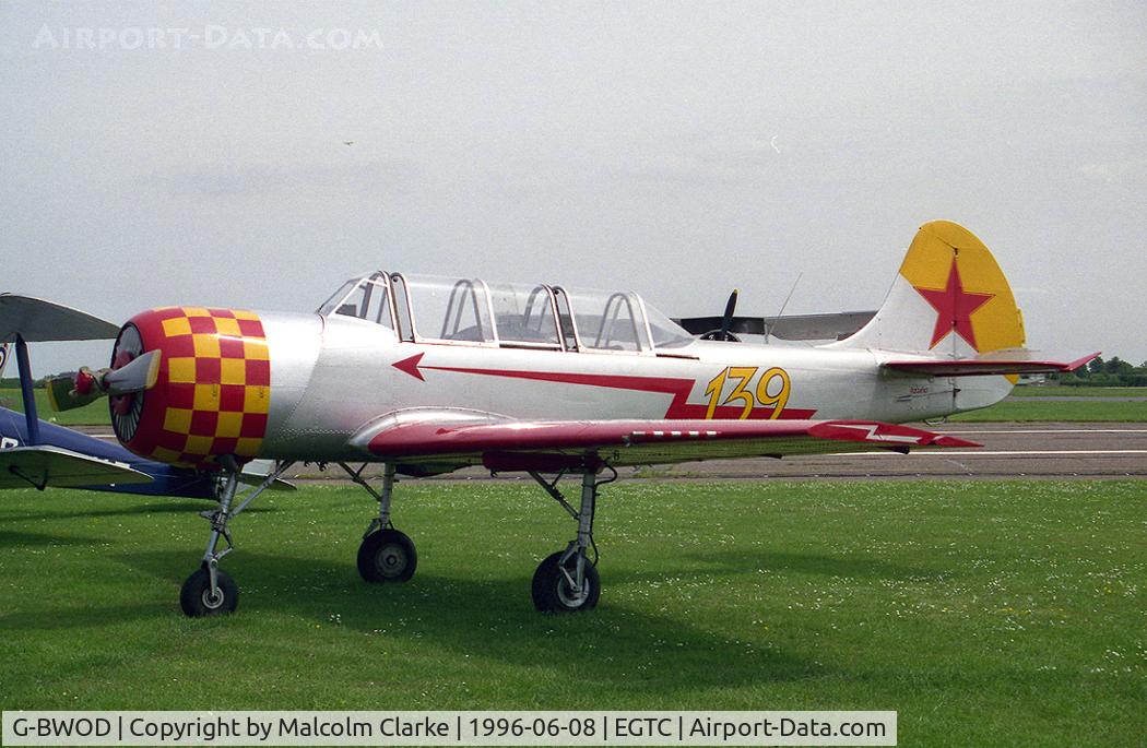 G-BWOD, 1983 Bacau Yak-52 C/N 833810, Bacau Yak-52. At Cranfield's celebration of the 50th anniversary of the College of Aeronautics in 1996.