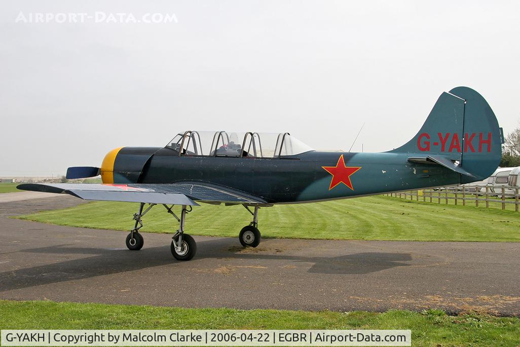G-YAKH, 1989 Bacau Yak-52 C/N 899915, Bacau Yak-52. At Breighton Airfield in 2006. Previously registered as RA-01948.