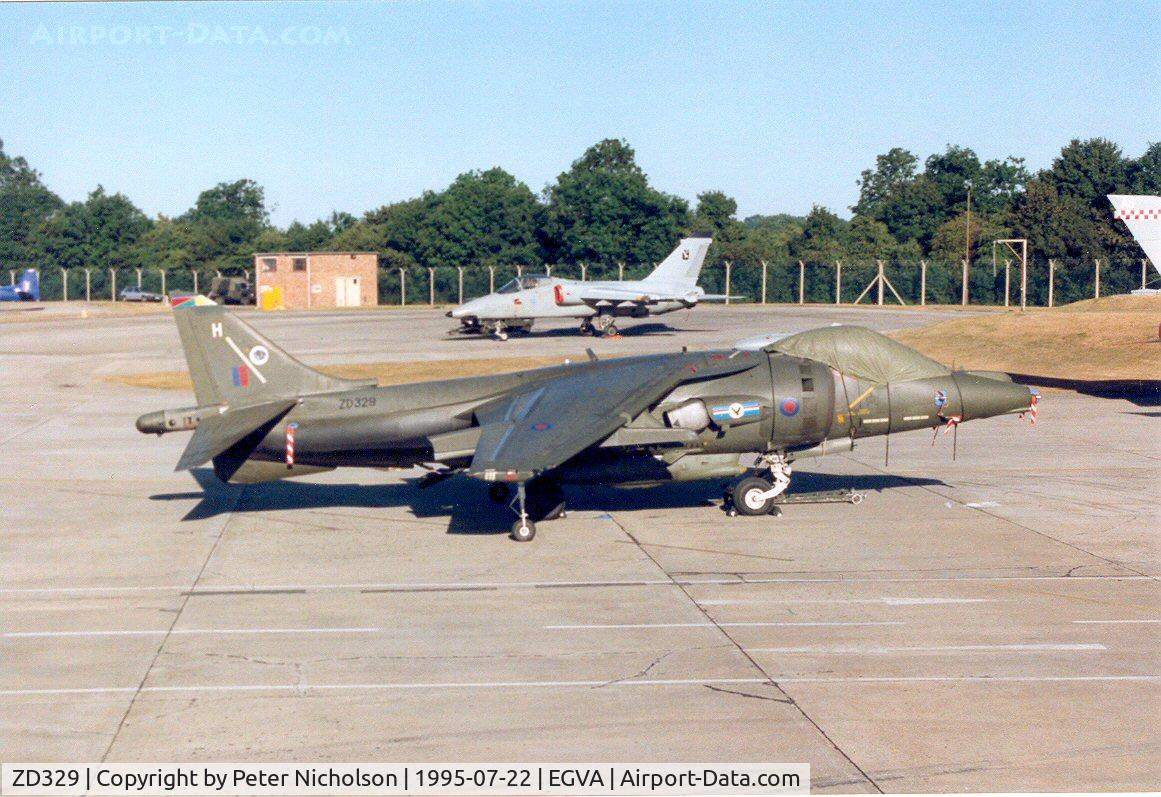 ZD329, 1988 British Aerospace Harrier GR.7 C/N P10, Harrier GR.7, callsign Wildcat 2, of 20[Reserve] Squadron on the flight-line at the 1995 Intnl Air Tattoo at RAF Fairford.