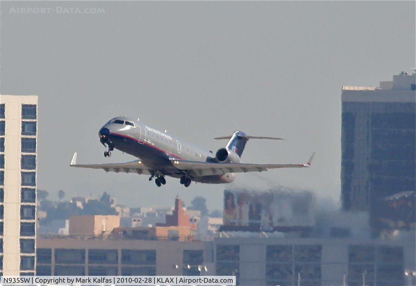 N935SW, 2002 Bombardier CRJ-200LR (CL-600-2B19) C/N 7725, SkyWest Bombardier CL-600-2B19, SKW6248 departing 25R for KSJC.