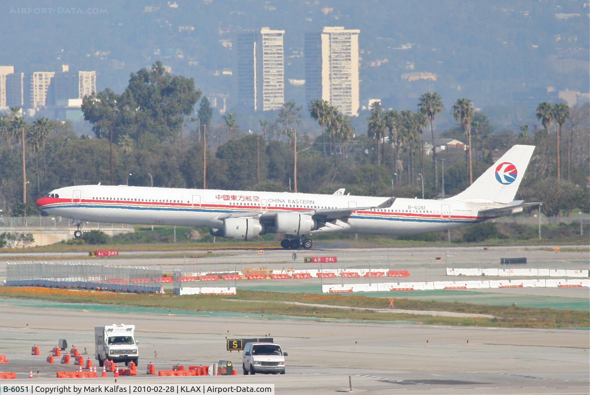 B-6051, 2003 Airbus A340-642 C/N 488, China Eastern Airbus A340-642, B-6051 arriving 24R KLAX.