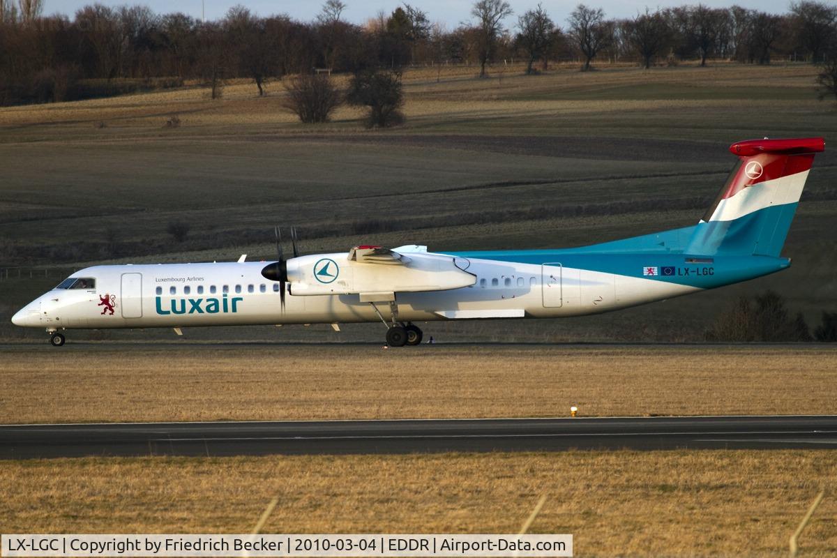 LX-LGC, 2007 De Havilland Canada DHC-8-402Q Dash 8 C/N 4162, taxying to the gate
