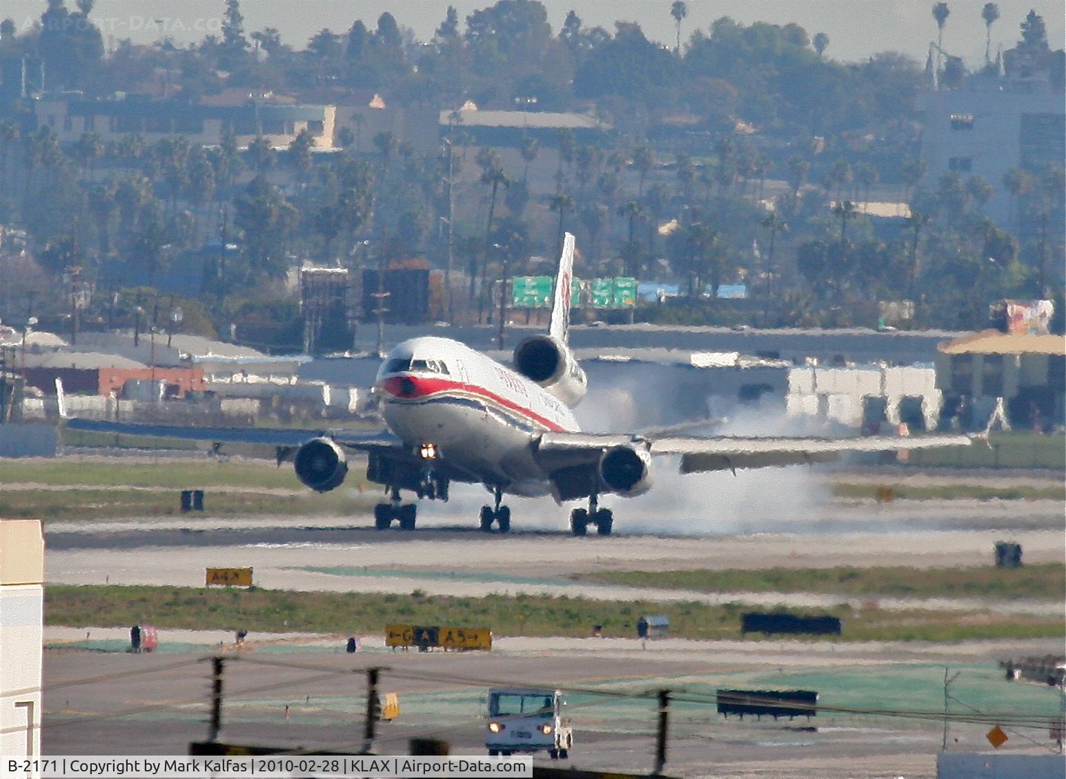 B-2171, 1991 McDonnell Douglas MD-11F C/N 48495, China Eastern Cargo Mcdonnell Douglas MD-11, touching down 25L KLAX.