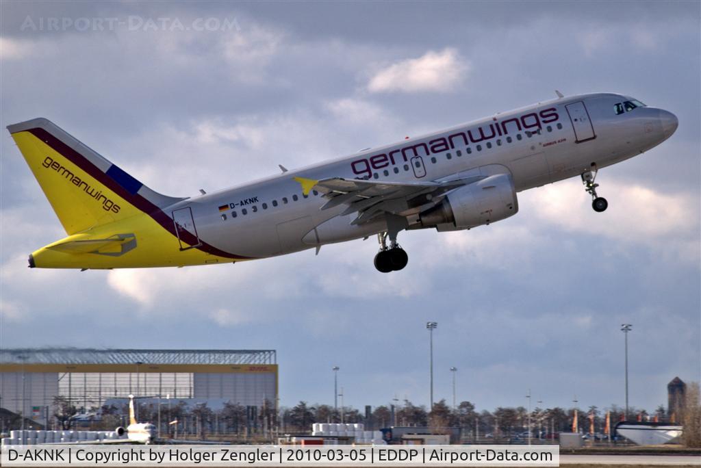 D-AKNK, 1999 Airbus A319-112 C/N 1077, And the old TU-134 in the background is watching those young chicks passing by...