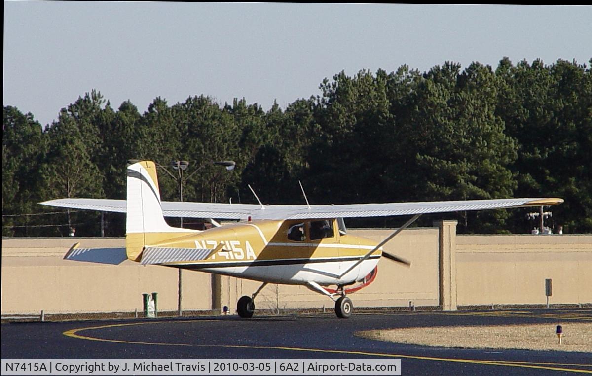 N7415A, 1956 Cessna 172 C/N 29515, Holding short of RWY32 at 6A2