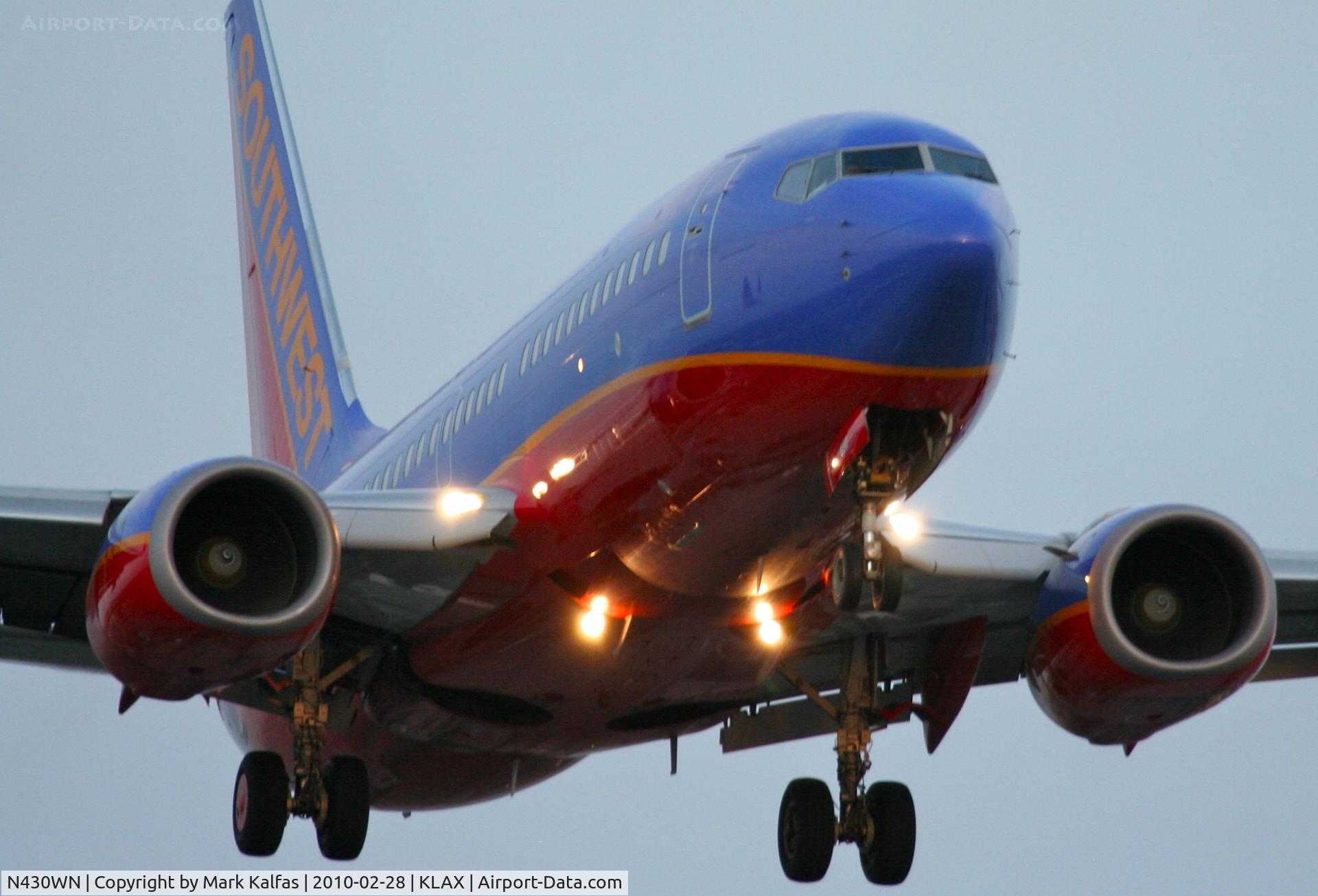 N430WN, 2002 Boeing 737-7H4 C/N 33659, Southwest Airlines Boeing 737-7H4, SWA242 from KPHX, 24R approach KLAX.