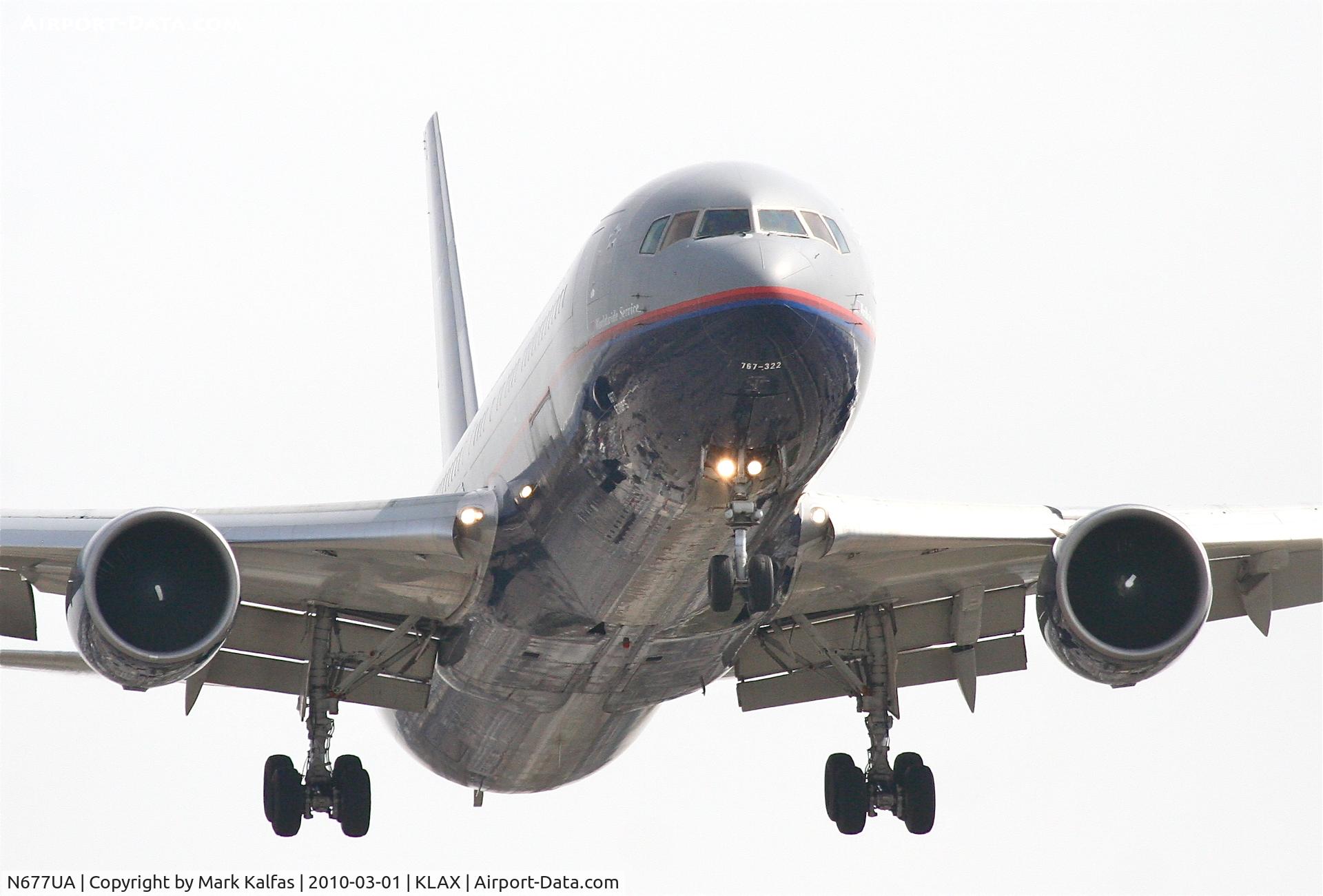 N677UA, 2001 Boeing 767-322 C/N 30029, United Airlines Boeing 767-322, UAL83 arriving from KIAD, 24R KLAX.